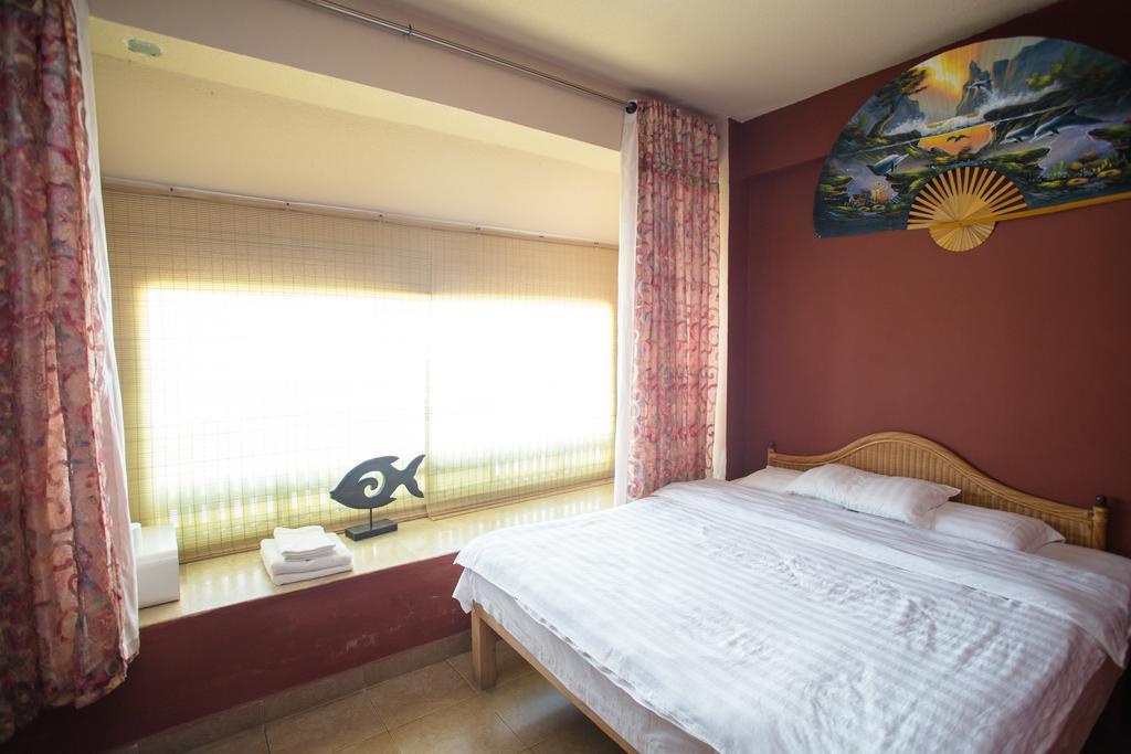 G.T. Guest House Garapan Rum bild