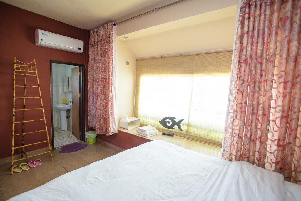 G.T. Guest House Garapan Rum bild