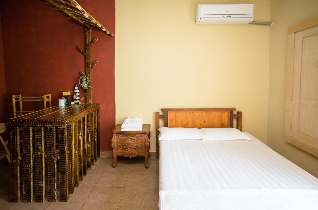 G.T. Guest House Garapan Rum bild