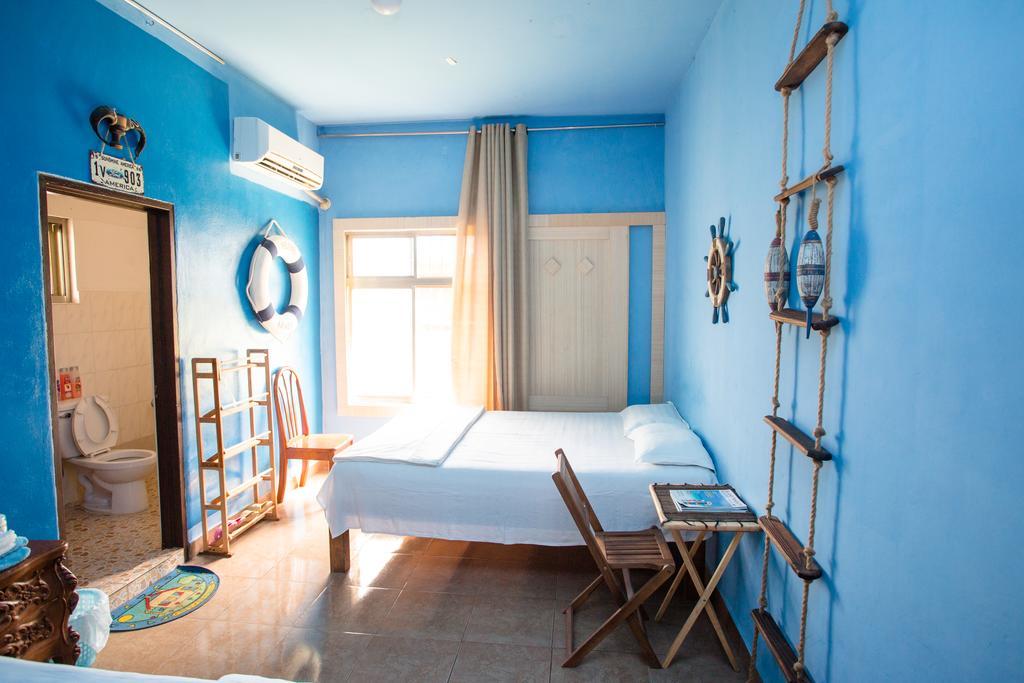 G.T. Guest House Garapan Rum bild