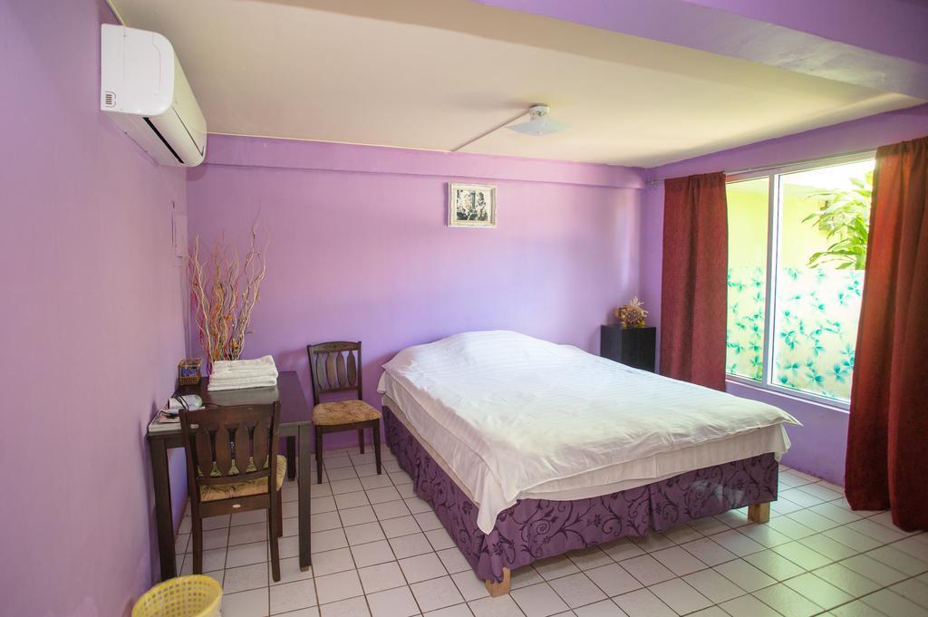 G.T. Guest House Garapan Rum bild